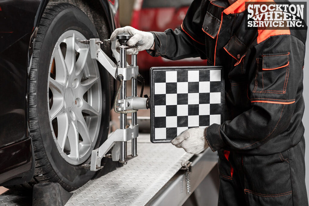 Wheel alignment equipment on a car