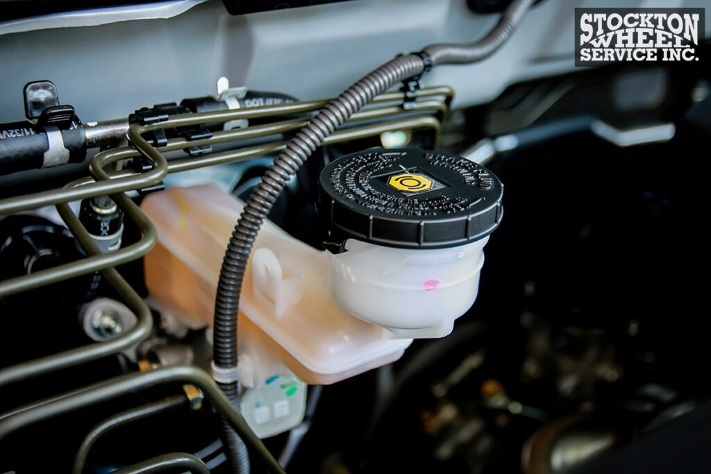 Closeup Brake fluid reservoir of car